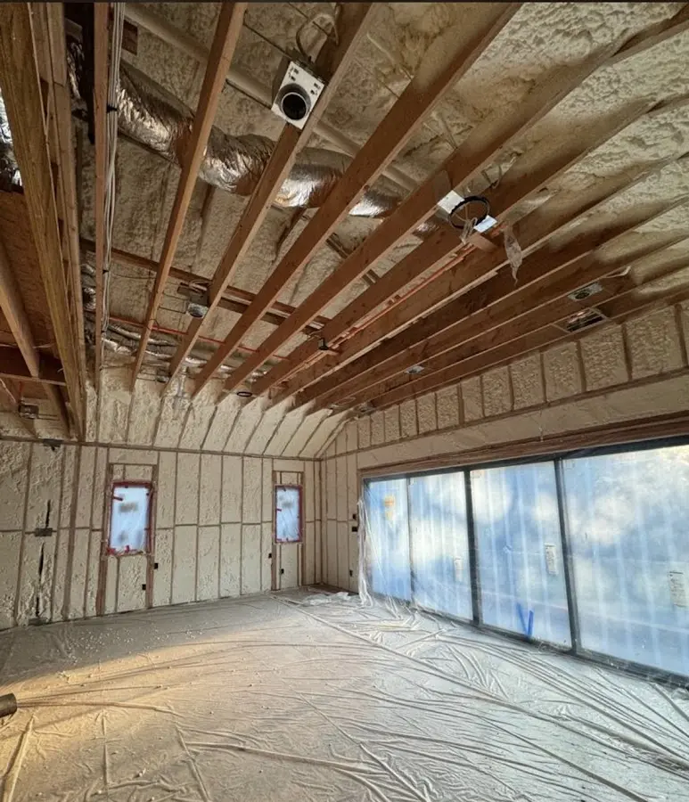 Interior walls and ceiling insulated with spray foam during new construction in Shelbyville