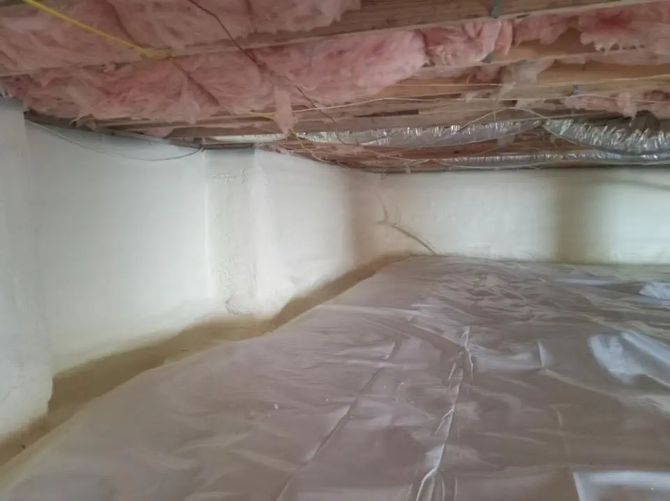 Crawl space encapsulation with closed-cell spray foam for Commercial Roof Restoration in Shelbyville